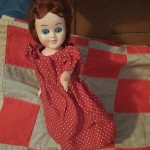 Vintage doll with shoes dress movable blue eyes, lids open close & arms move